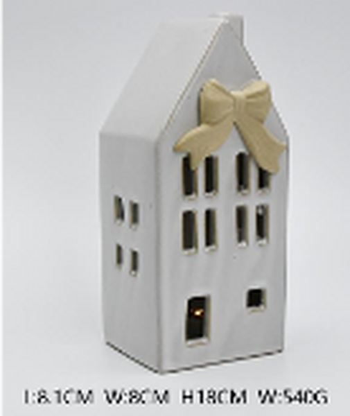 Reference image of white ceramic house with bow and printed measurements