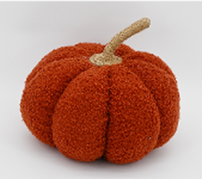 Angled view of large orange boucle pumpkin ornament