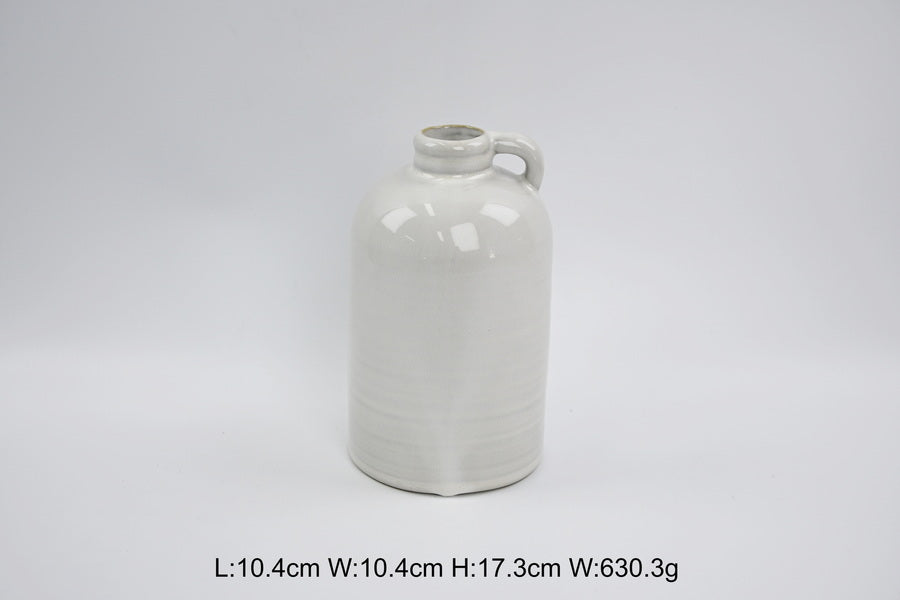 Short white jug-shaped vase with printed measurements