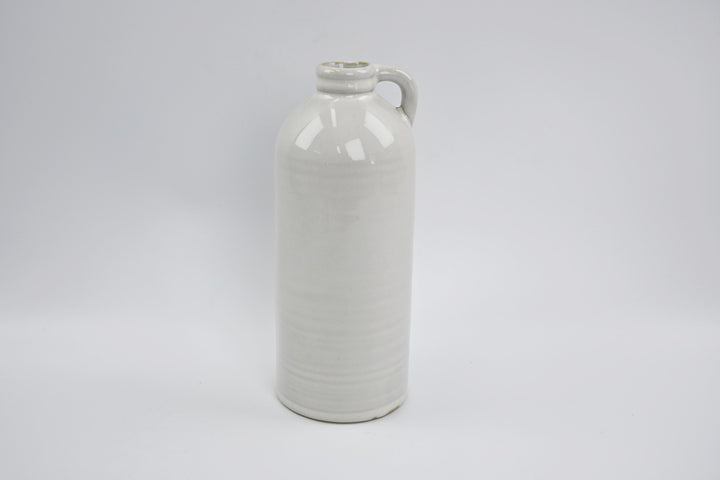 Tall white jug-shaped vase with a small handle
