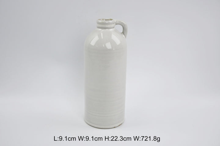 Tall white jug-shaped vase with printed measurements