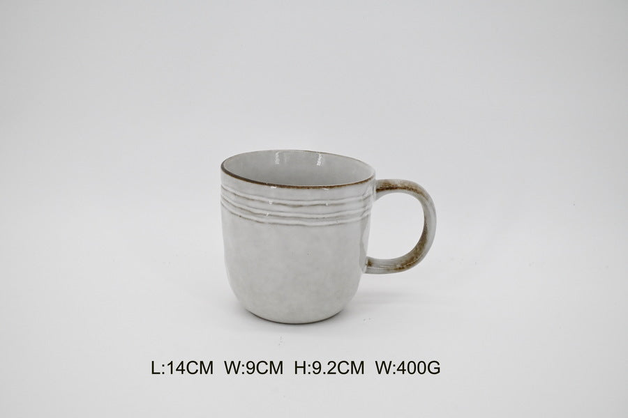 Pale grey stoneware mug shown with a printed size and weight caption