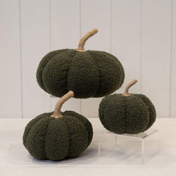 Three green boucle pumpkin ornaments in coordinating sizes