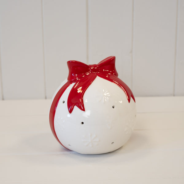 White Christmas bauble with a red bow