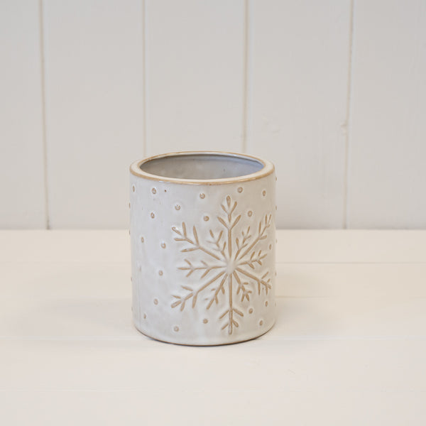 White pot with raised snowflake detail