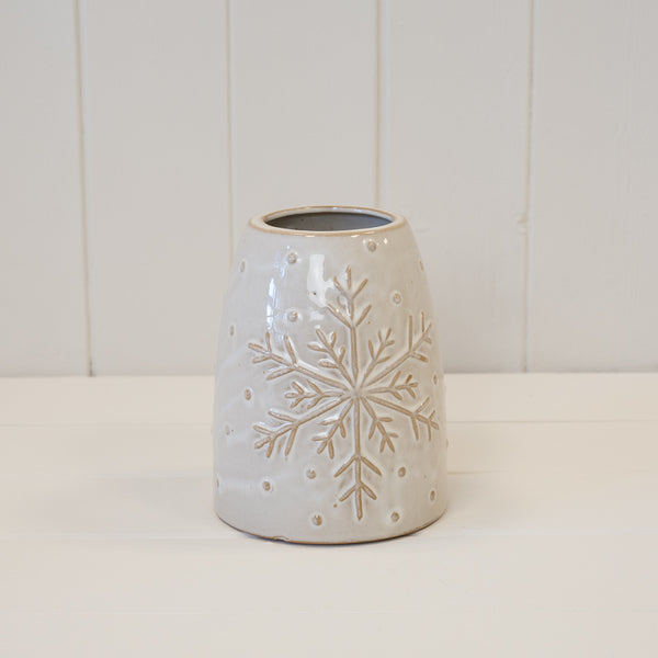 Short white vase with raised snowflake detail