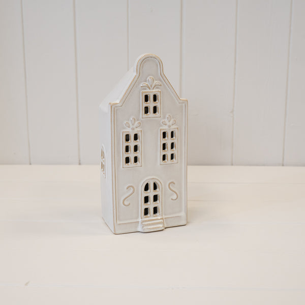 Large white LED Christmas townhouse with cut-out windows