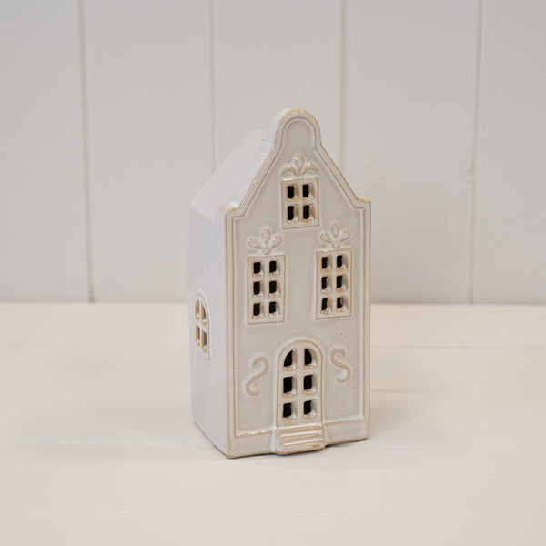 Medium white LED Christmas townhouse with cut-out windows