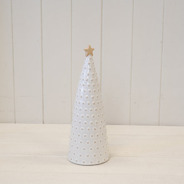 Medium white bobbin-textured ceramic Christmas tree with a gold star