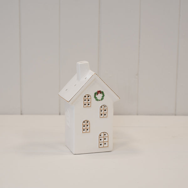 Small white LED house with wreath, shown unlit
