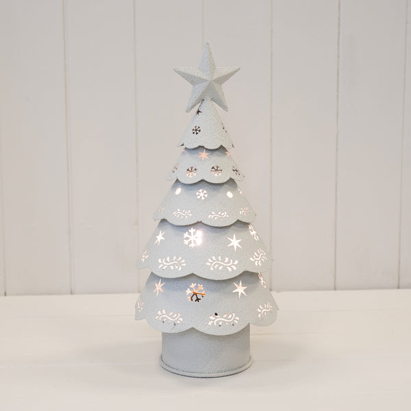 Illuminated off-white metal Christmas tree with star topper and cut-out patterns
