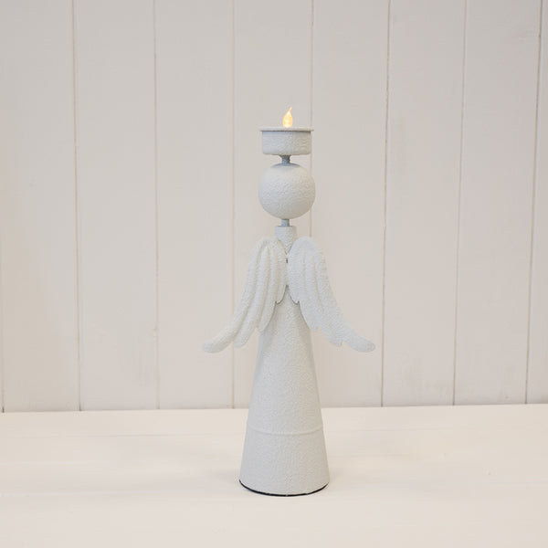 Rear view of the off-white angel tealight holder showing its wings