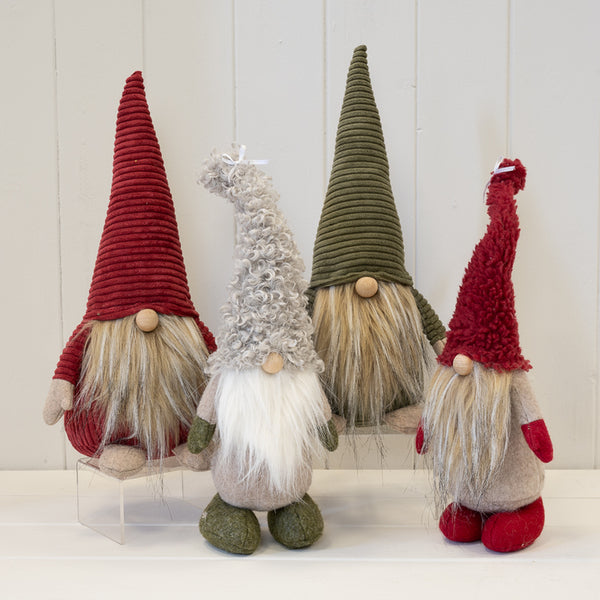 Red Santa gonk displayed with three coordinating festive gonks