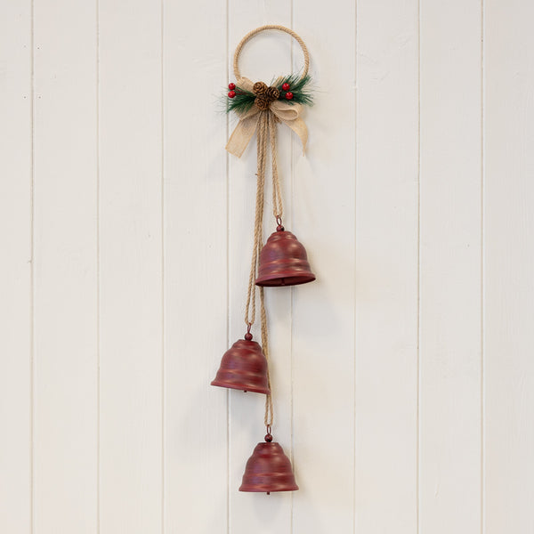 Hanging trio of red bells on a natural hoop with festive foliage